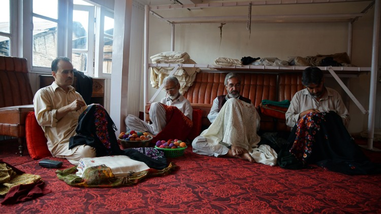 Artisans working on Pashmina shawls  